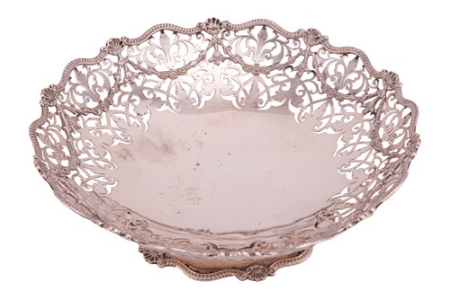 Lot 307 - A silver bowl of round form, the pierced and...