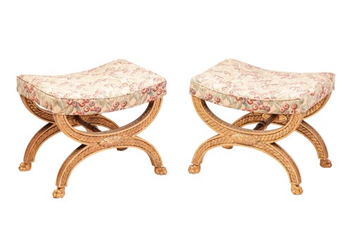 Lot 185 - A pair of Regency carved wood and gilt gesso...