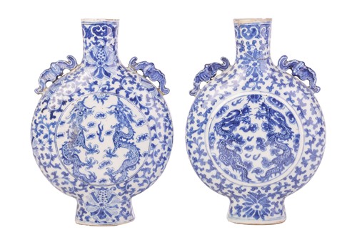 Lot 109 - A near pair of Chinese blue and porcelain...