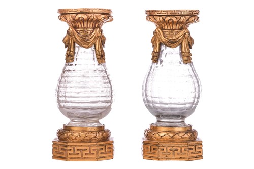 Lot 352 - A pair of Regency rock crystal cut glass and...