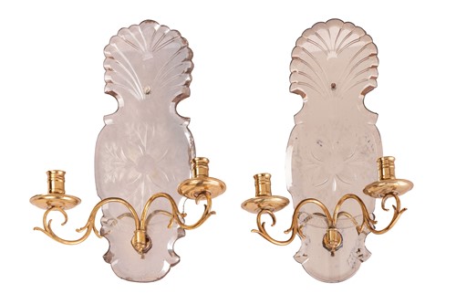 Lot 322 - A pair of 1920s mirrored wall candle sconces,...