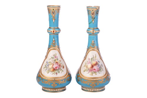 Lot 331 - A pair of Sevres porcelain bleu celeste vases,...