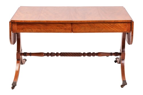 Lot 249 - A Regency mahogany two-flap sofa table with...