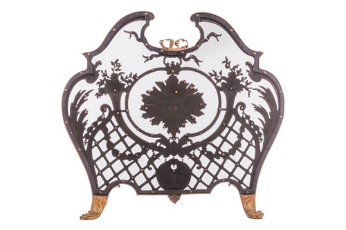 Lot 190 - A Louis V style gilt metal fire screen, with...