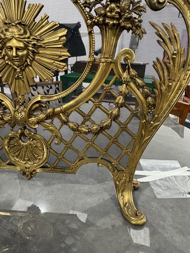 Lot 190 - A Louis V style gilt metal fire screen, with...