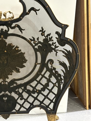 Lot 190 - A Louis V style gilt metal fire screen, with...