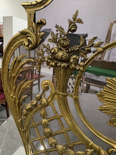 Lot 190 - A Louis V style gilt metal fire screen, with...