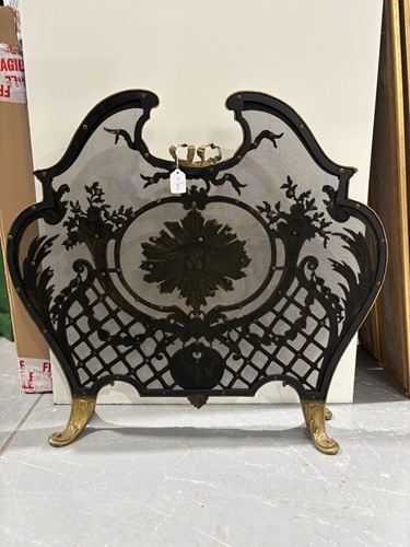 Lot 190 - A Louis V style gilt metal fire screen, with...