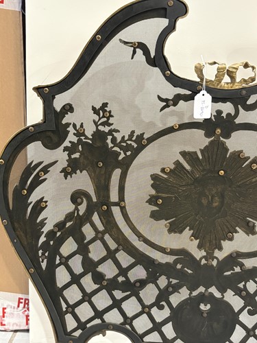 Lot 190 - A Louis V style gilt metal fire screen, with...