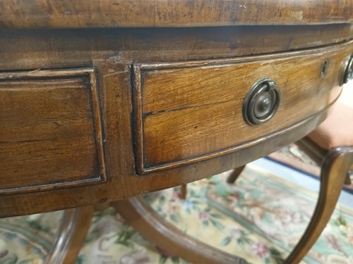Lot 217 - A George III mahogany revolving circular drum...
