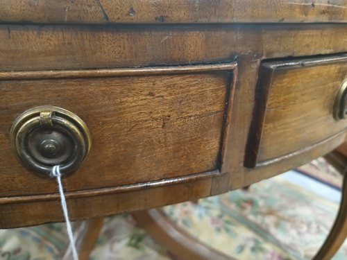 Lot 217 - A George III mahogany revolving circular drum...