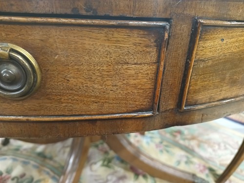 Lot 217 - A George III mahogany revolving circular drum...