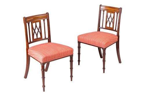 Lot 186 - A long set of fourteen Regency mahogany dining...
