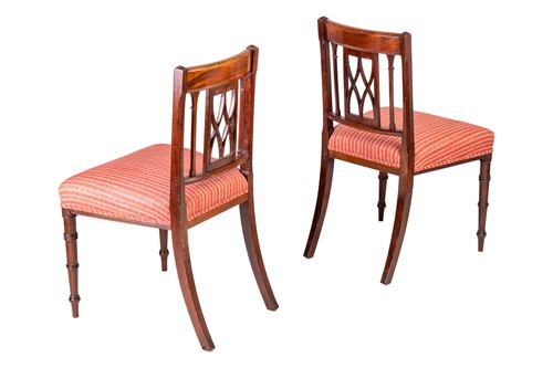 Lot 186 - A long set of fourteen Regency mahogany dining...