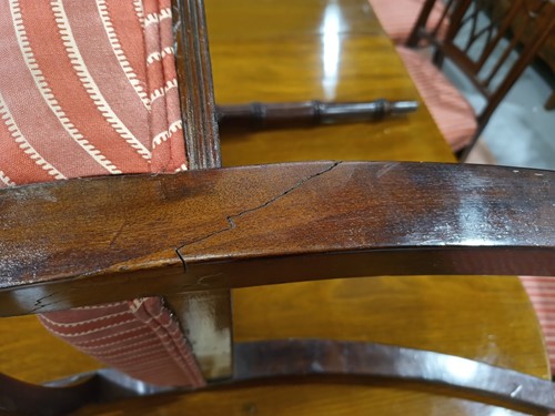 Lot 186 - A long set of fourteen Regency mahogany dining...