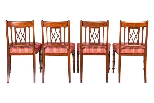 Lot 186 - A long set of fourteen Regency mahogany dining...