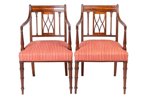 Lot 186 - A long set of fourteen Regency mahogany dining...