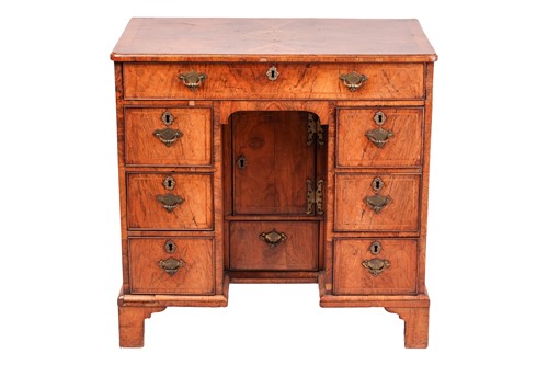 Lot 275 - A walnut lady's kneehole desk, early 18th...