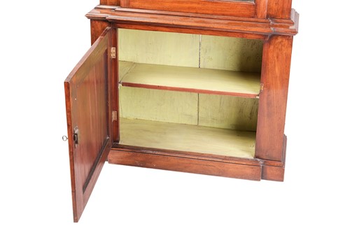 Lot 228 - A Victorian narrow pillar bookcase, with an...