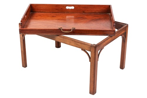 Lot 252 - A mahognay butlers tray on stand, the...