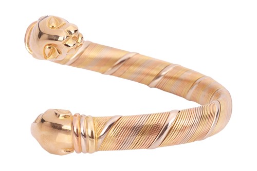 Lot 237 - Cartier - a Panthère cuff bracelet in 18ct...