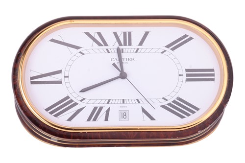 Lot Cartier - A Faux Tortoise Shell Quartz Alarm...