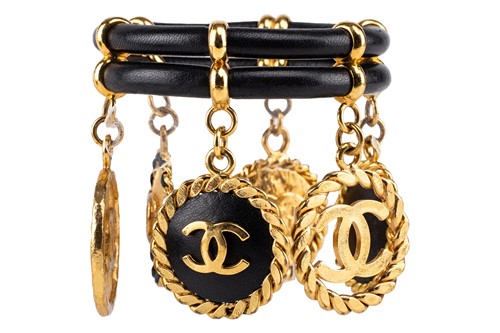 Lot Chanel - a 1992 padded black leather bangle,...