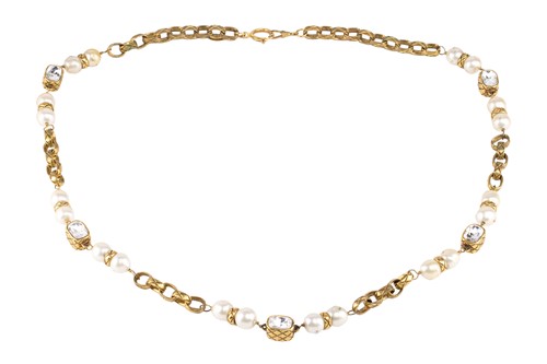 Lot 154 - Chanel - a long beaded necklace, designed by...