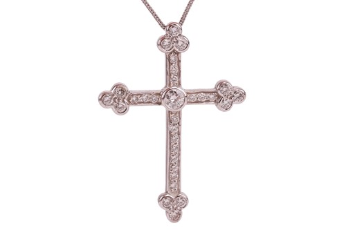 Lot A diamond cross pendant on chain, collet-set...