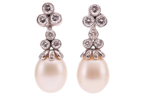 Lot 1 - A pair of diamond and pearl day and night...