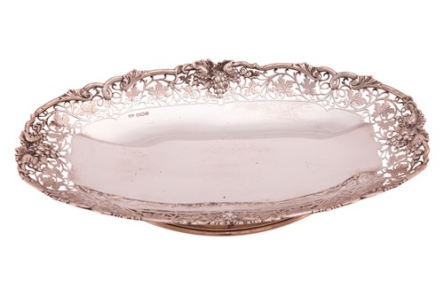 Lot 310 - A silver fruit bowl, of oval form the pierced...