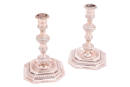 Lot 312 - C J Vander Ltd; a pair of silver candlesticks,...