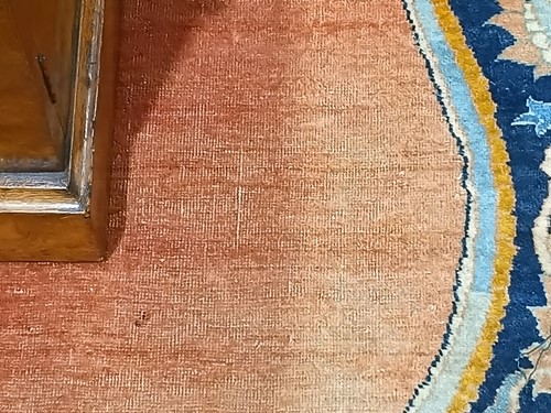 Lot 289 - A room size 'Antique' tomato red round Tabriz...