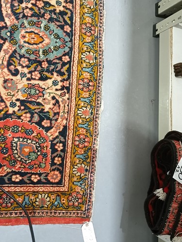 Lot 289 - A room size 'Antique' tomato red round Tabriz...