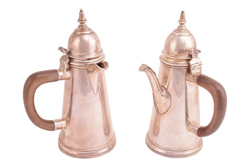 Lot 319 - A matched silver chocolate pot and coffee pot,...