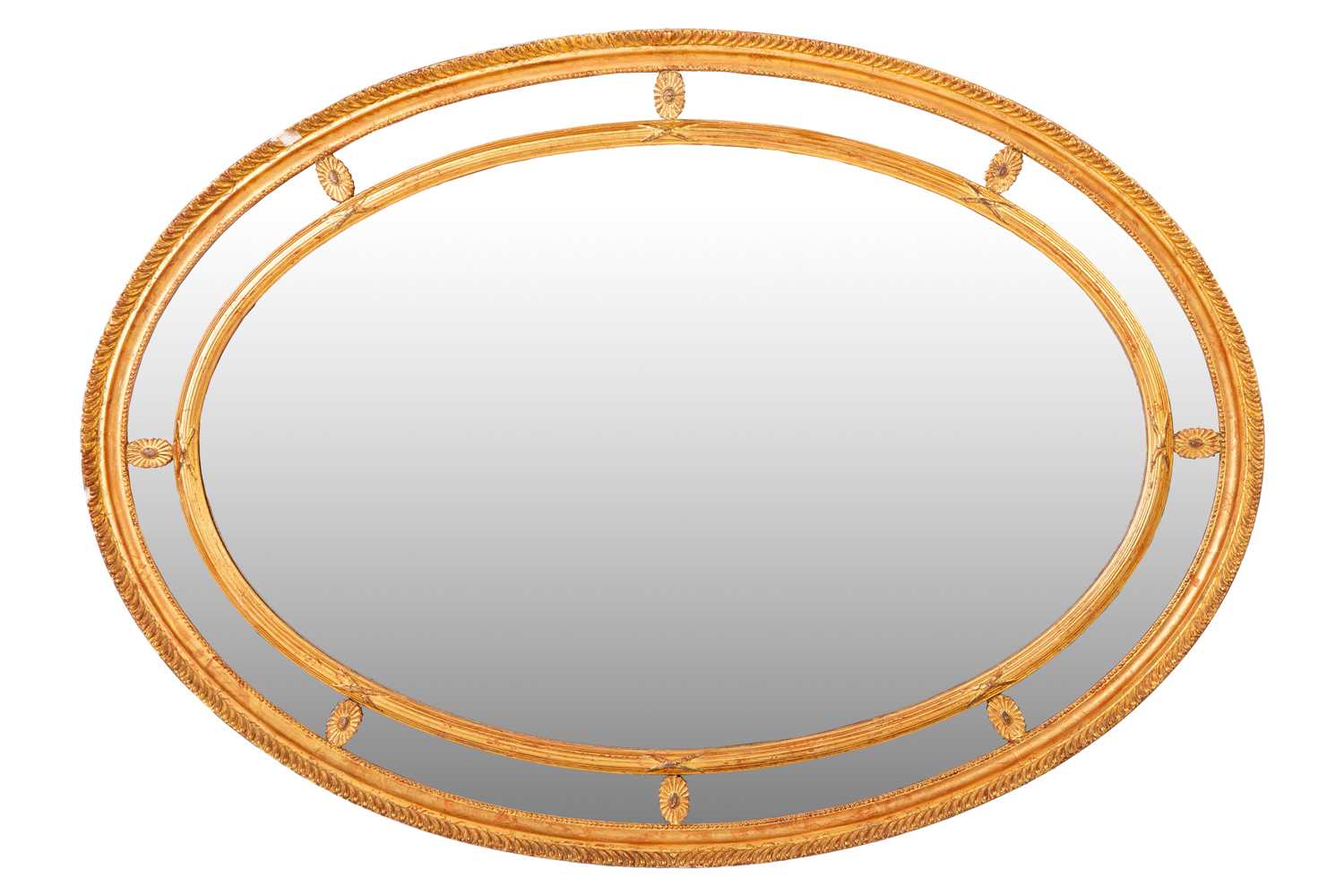 Lot 283 - A George III-style oval carved wood and gilt...