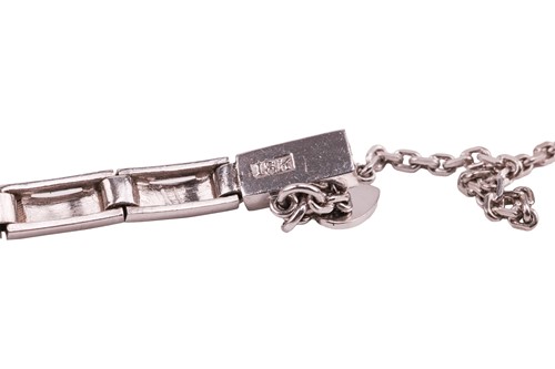 Lot 64 - A diamond-set bracelet, claw-set with twelve...