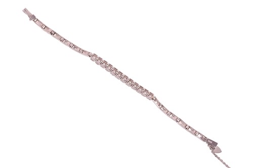 Lot 64 - A diamond-set bracelet, claw-set with twelve...