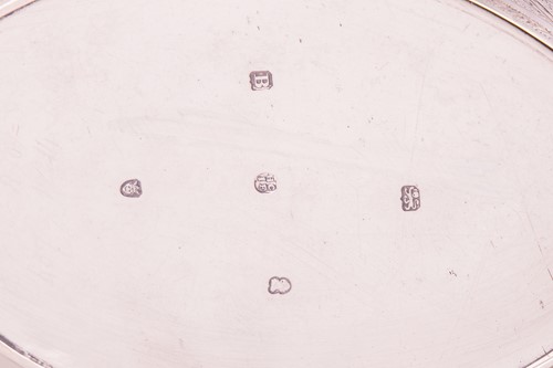 Lot 374 - A George III silver teapot, of oval form with...