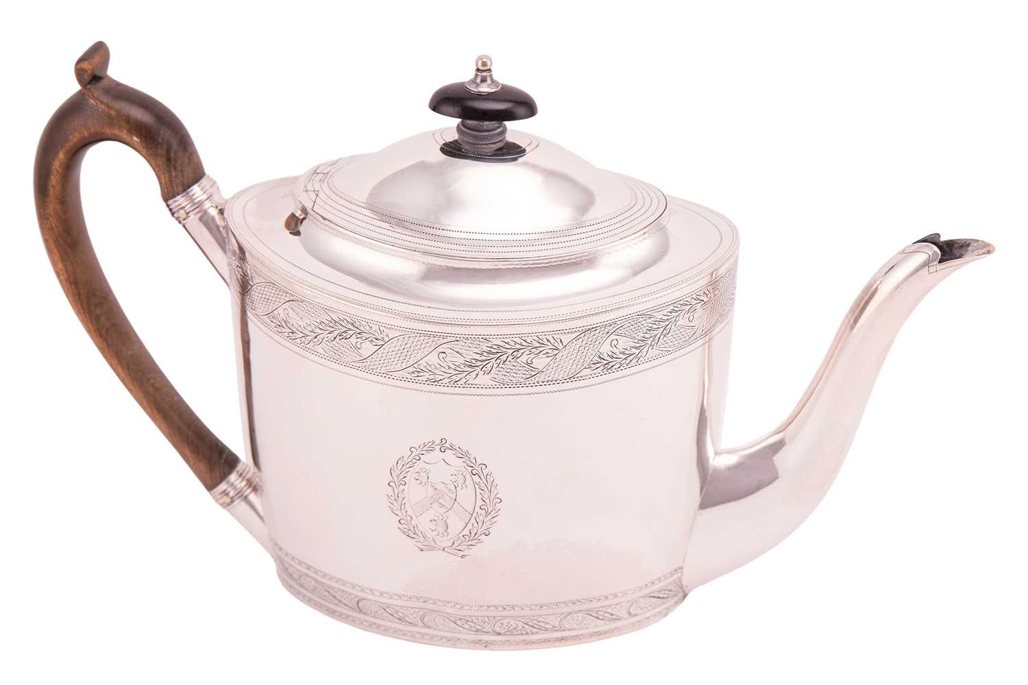 Lot 374 - A George III silver teapot, of oval form with...