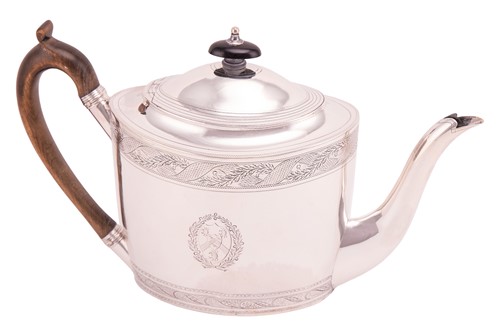 Lot 326 - A George III silver teapot, of oval form with...