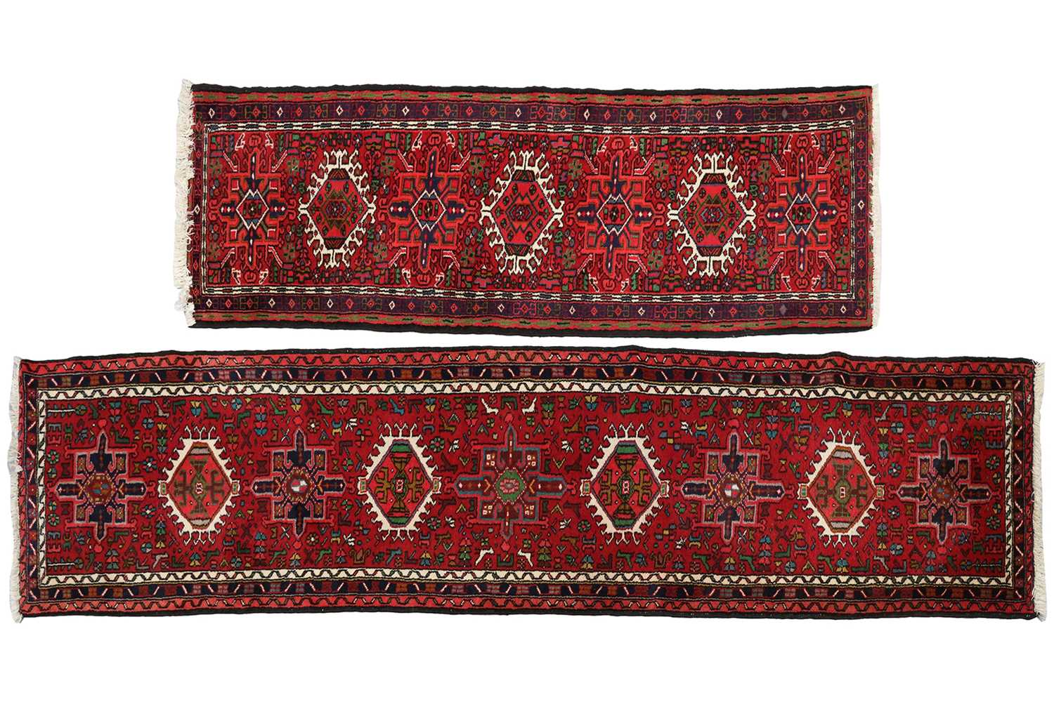 Lot 147 - A red ground Karaja strip runner with nice...