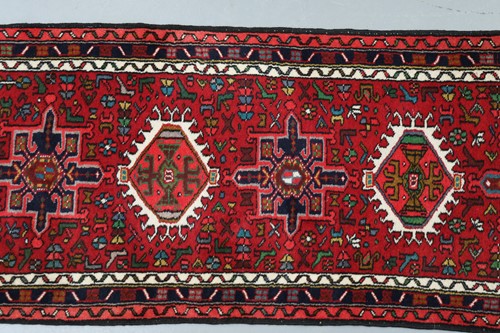 Lot 147 - A red ground Karaja strip runner with nice...