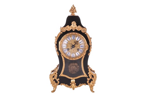 Lot 303 - An ebonised Louis XV style balloon clock, with...