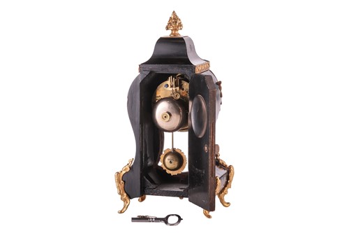 Lot 303 - An ebonised Louis XV style balloon clock, with...
