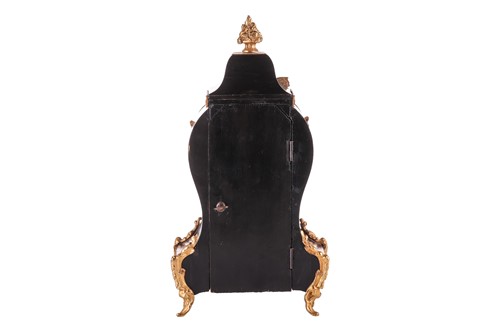 Lot 303 - An ebonised Louis XV style balloon clock, with...