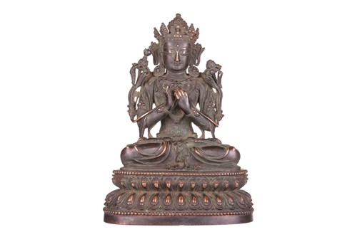 Lot A Sino-Tibetan bronze figure of Tara seated in...