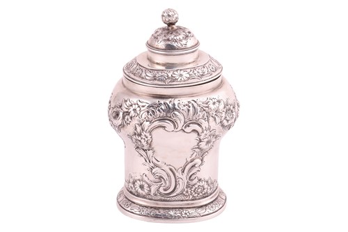 Lot A George II silver tea caddy; inverted...