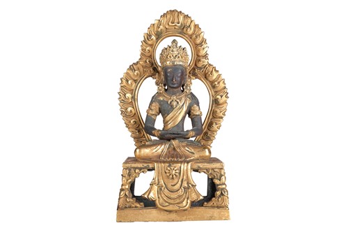 Lot 146 - A Sino-Tibetan gilt bronze figure of Buddha,...