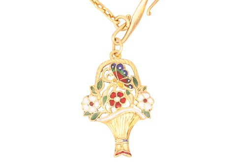 Lot 82 - A giardinetti enamel pendant on a fancy link...